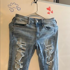 Light blue distressed jeans